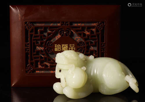 A HETIAN JADE CARVED BEAST SHAPED PENDANT