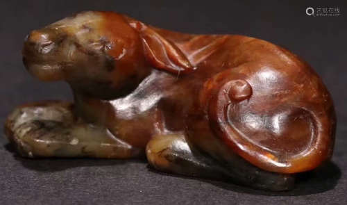 A HETIAN JADE CARVED DOG SHAPED PENDANT