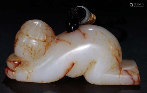 A HETIAN JADE CHILD SHAPED PENDANT