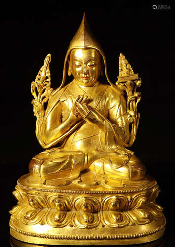 A GILT BRONZE CASTED TSONGKAHAPA STATUE