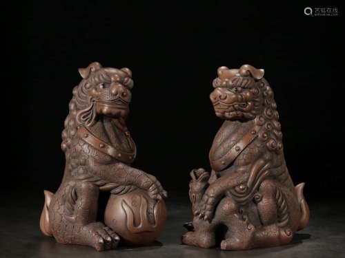 A Chinese Lion Purple Sand Ornament