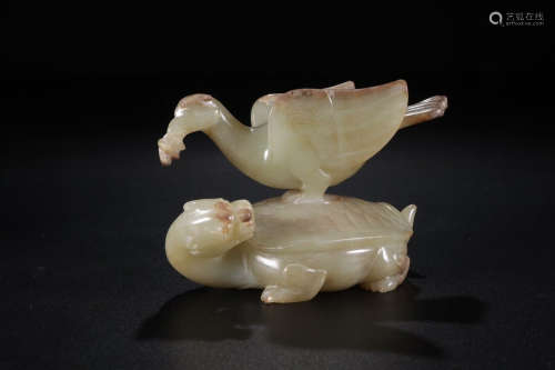 A Chinese Gao Gu Jade Ornament