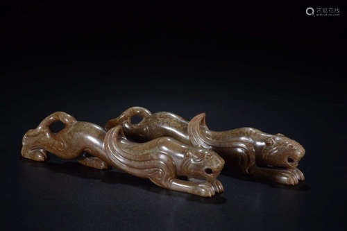 A Pair of Gao Gu Jade Tiger Ornaments