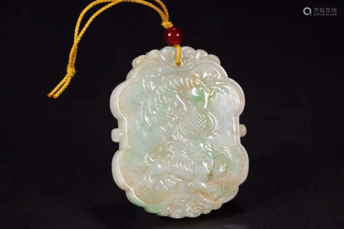 A Chinese Carved Jadeite Pendant