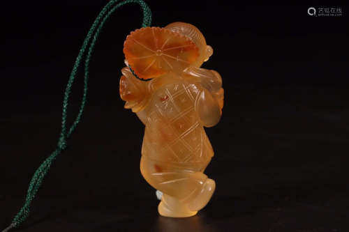 A Chinese Carved Agate Boy Ornament