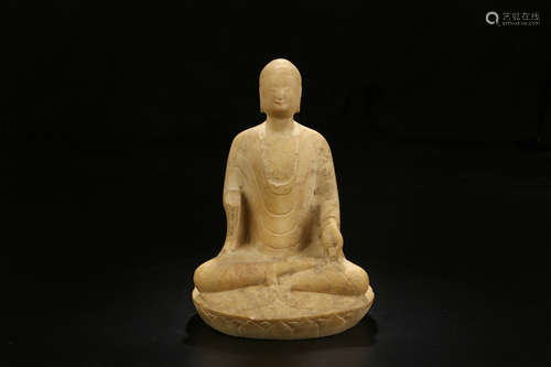 A CHINESE WHITE JADE BUDDHA STATUE