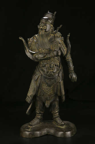 A CHINESE COPPER STATUE OF THE DUKE GUAN