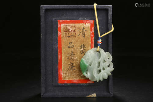 A CHINESE CARVED JADEITE PENDANT