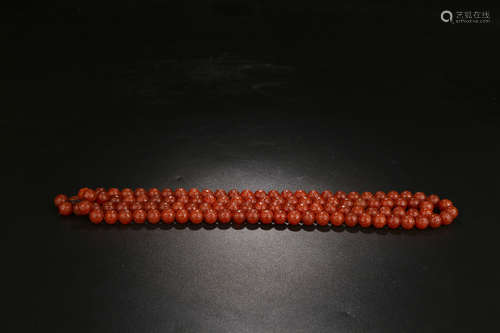 A CHINESE AGATE PRAYER BEADS STRING