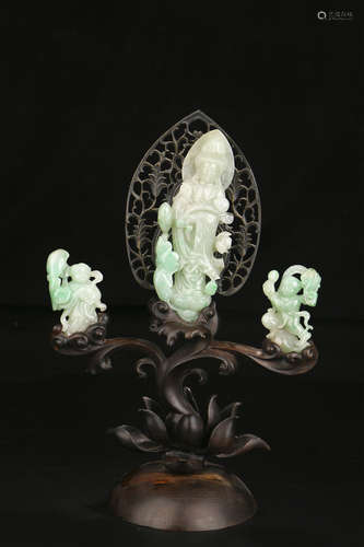 A CHINESE CARVED JADEITE ORNAMENT