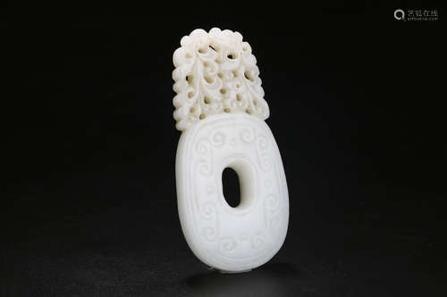 A CHINESE CARVED HETIAN JADE BI ORNAMENT