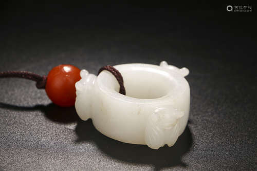 A CHINESE HETIAN JADE THUMB RING