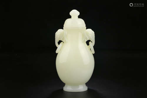 A CHINESE CARVED HETIAN JADE VASE