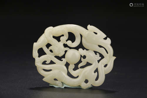 A CHINESE DRAGON CARVED HETIAN JADE BI ORNAMENT