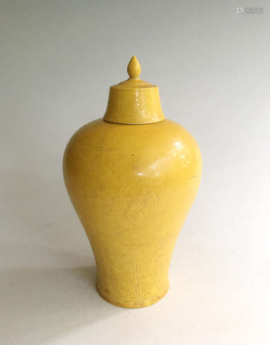 YELLOW GLAZED AND CARVED 'DRAGON AND PHOENIX' JAR WITH COVER