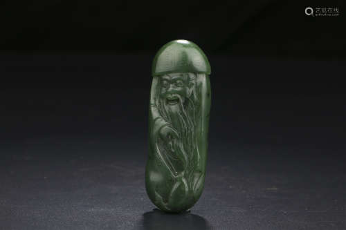 A CHINESE GREEN JADE CARVED PENDANT