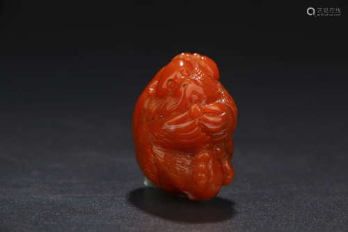 A CHINESE BEAST SHAPED SOUTHERN RED AGATE ORNAMENT