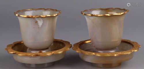 AN AGATE GILT BRONZE CARVED CUP