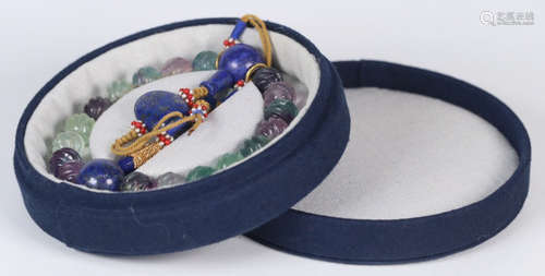 A TOURMALINE BEADS STRING NECKLACE WITH LAZULI