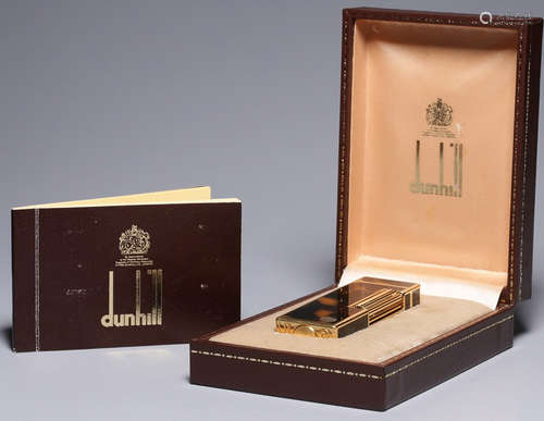 A DUNHILL SWIAAMADE LACQUER CARVED WITH BRAND NAME