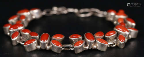 A SILVER CASTED BRACELET WITH CORAL