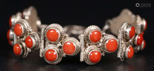 A SILVER CASTED BRACELET WITH CORAL