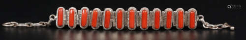 A SILVER CASTED BRACELET WITH CORAL