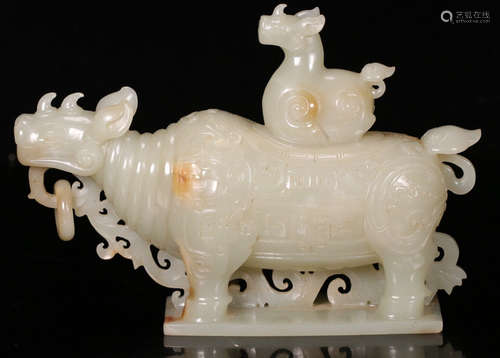 A HETIAN JADE BRUSH WASHER CARVED WITH RHINOCEROS