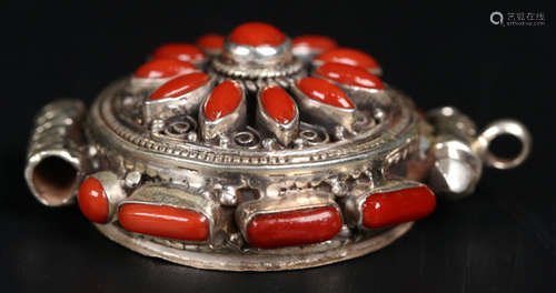 A SILVER CASTED BOX WITH CORAL