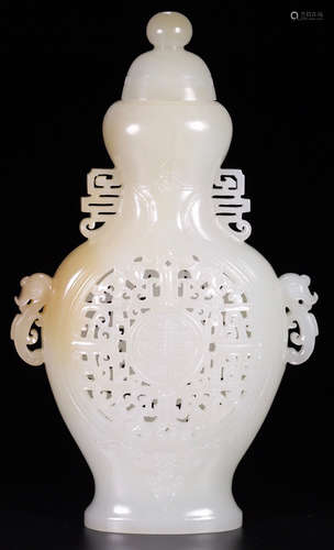 A HETIAN JADE CARVED AUSPICIOUS PATTERN VASE