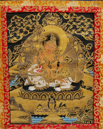 A TIBETAN CAISHEN VERTICAL AXIS THANGKA