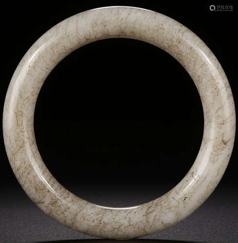 A HETIAN JADE CARVED AUSPICIOUS BANGLE