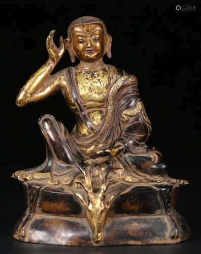 A GILT BRONZE CASTED MAHASIDDHA BUDDHA STATUE