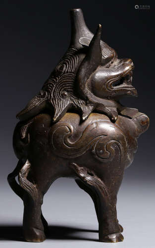 A COPPER CENSER CARVED WITH LION