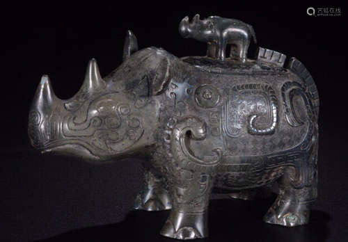 A COPPER CENSER CARVED WITH RHINOCEROS