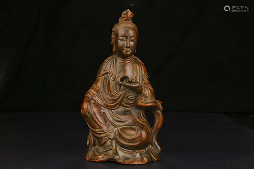 A CHINESE CARVED EAGLEWOOD GUANYIN ORNAMENT