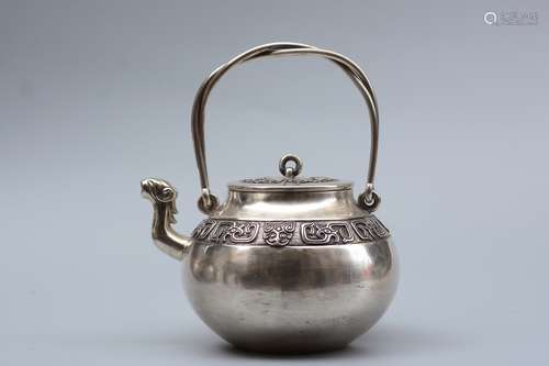 JAPANESE SILVER CAST AND CARVED TEAPOT WITH LIFTING HANDLE