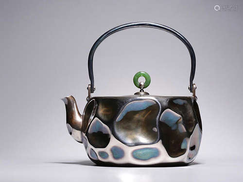 JAPANESE SILVER CAST AND CARVED TEAPOT WITH LIFTING HANDLE AND JADEITE FINIAL