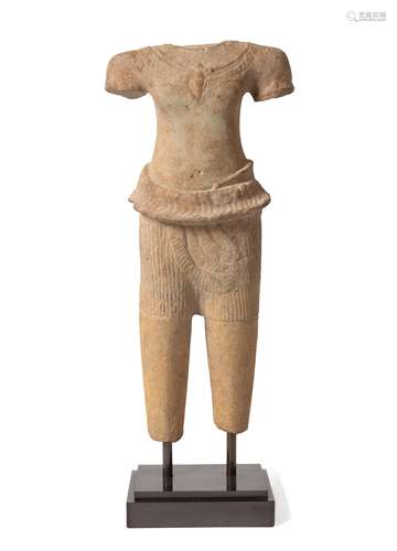 A Khmer Sandstone Torso of Vishnu Height 18 in., 46 cm.