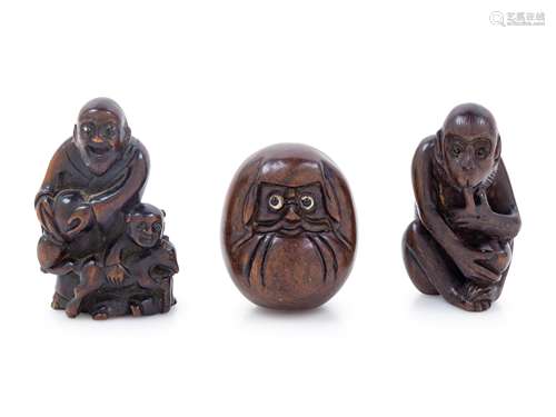 Three Japanese Wood Netsuke Length of largest 2 in., 5