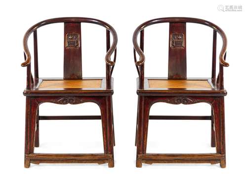 A Pair of Chinese Elmwood Horseshoe-Back Armchairs