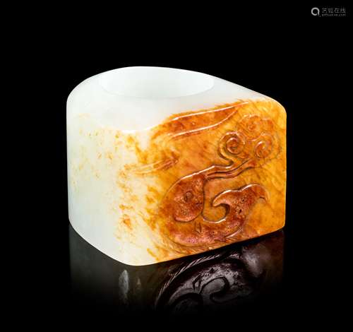 A Chinese White and Russet Jade Archer's Ring Interior