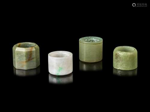 Four Chinese Jade and Jadiete Archer's Rings Average