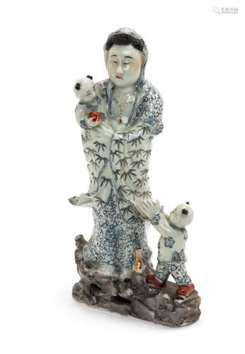 A Chinese Blue, Red and Gilt Enameled Porcelain Figural