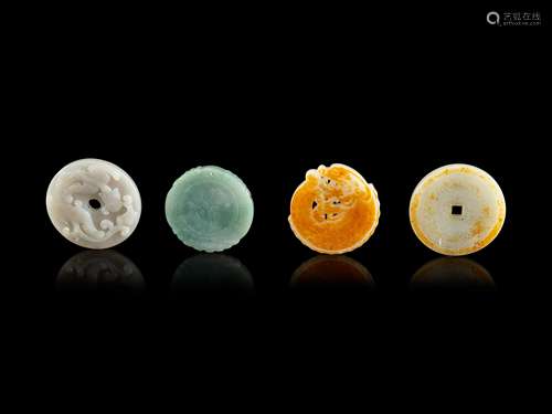 Four Chinese Jade and Jadeite Circular Pendants