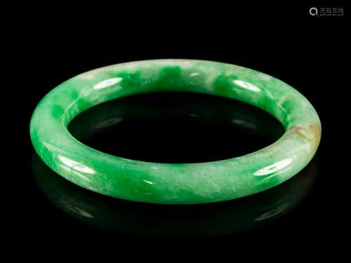 A Chinese Green Jadeite Bangle