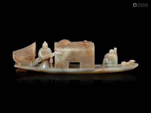 A Chinese Celadon and Russet Jade Boat Length 11 in.,