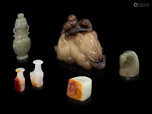 Six Chinese Celadon and Russet Jade Articles Length of