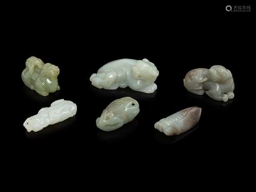 Six Chinese Celadon and Russet Jade Articles Length of