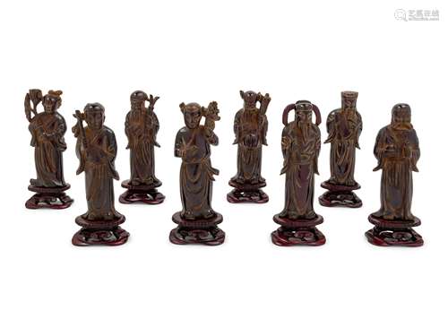 Eight Chinese Black Hardstone Figures of Immortals